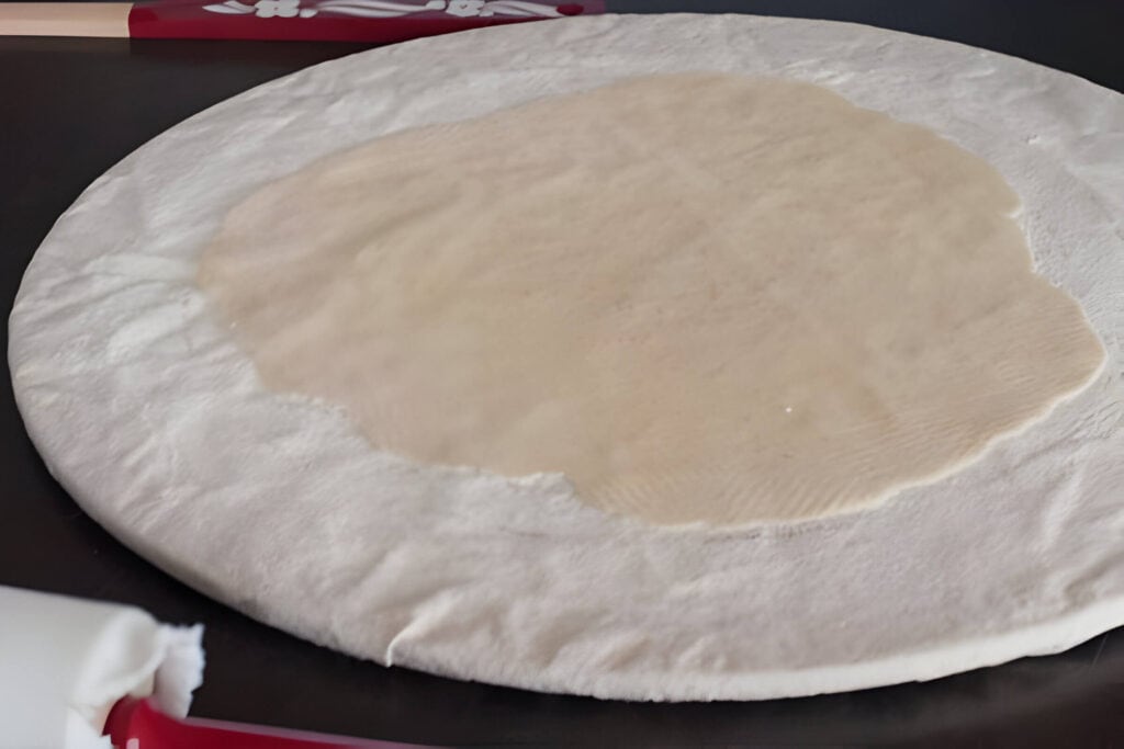Lefse Dough Rolled Out onto Pastry Board