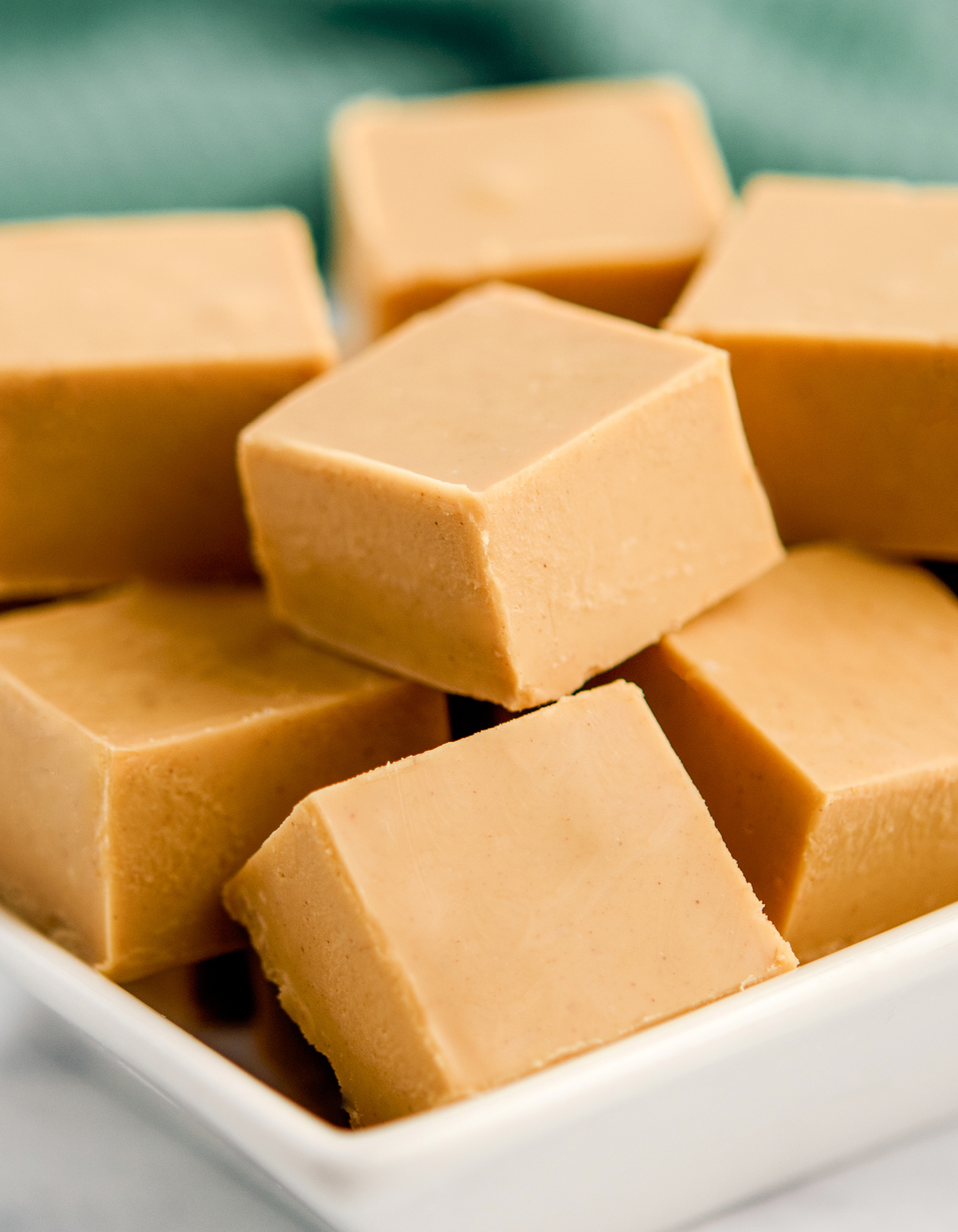 Squares of Peanut Butter Fudge in White Bowl