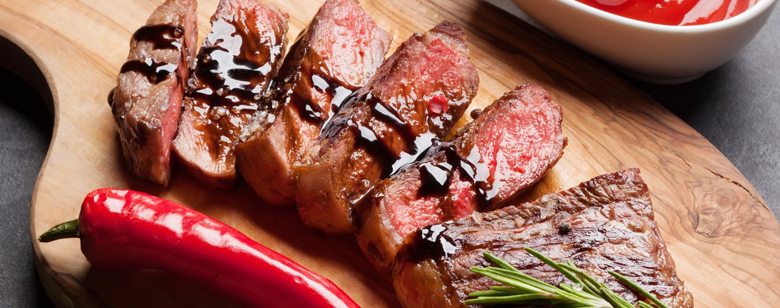 Steak Topped with Condiments