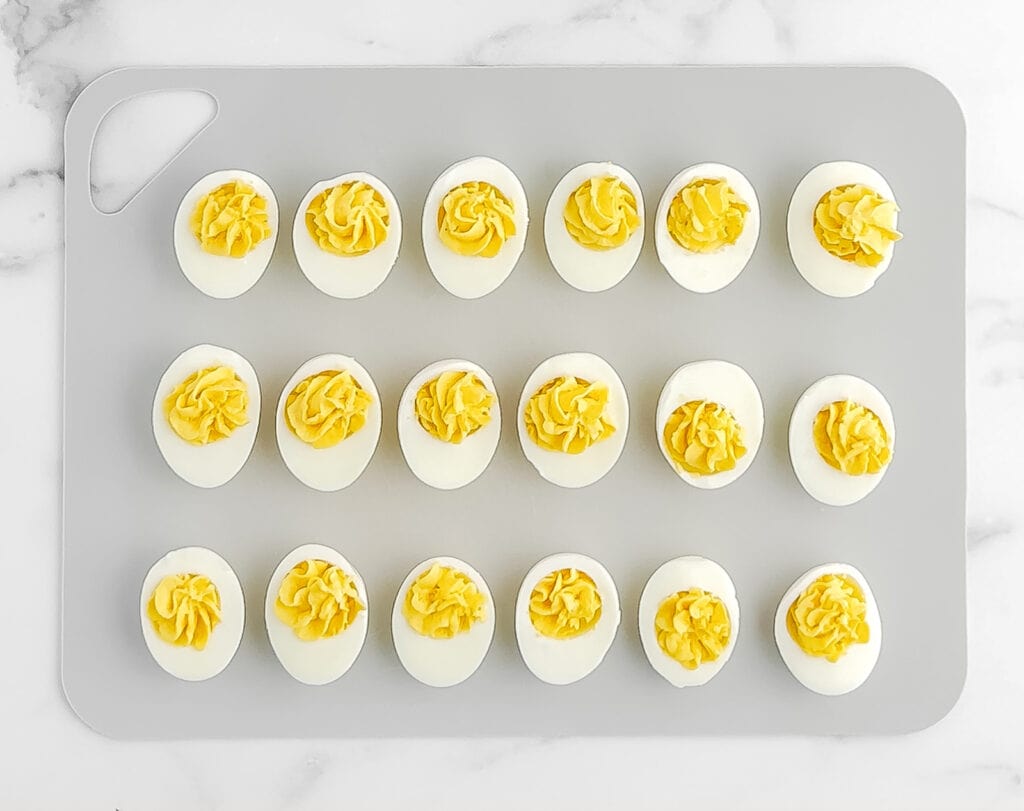 Piped Eggs on Grey Cutting Board