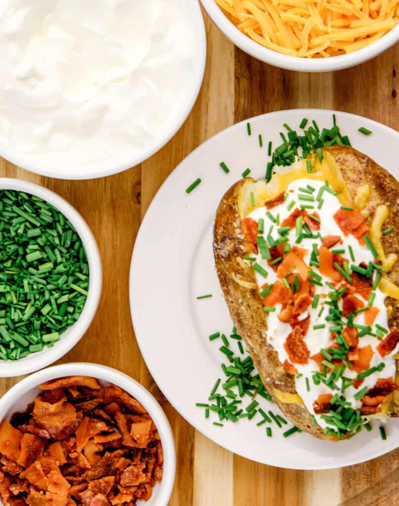 Baked Potato with Mouthwatering Toppings Top Down View