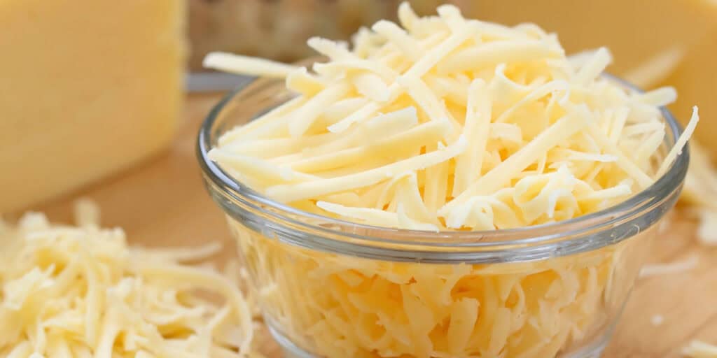 Shredded Cheese in Glass Bowl