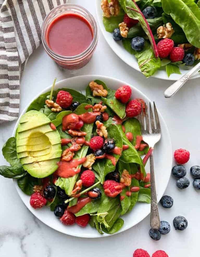 Whole30 Berry Salad on White Plate with Avocado and Fork
