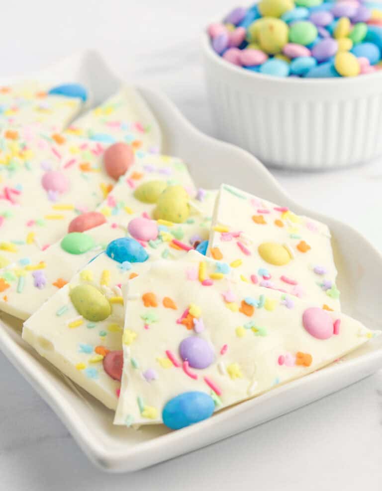 Easter Bark with White Chocolate and Candy on Serving Platter with M&MS in a Bowl