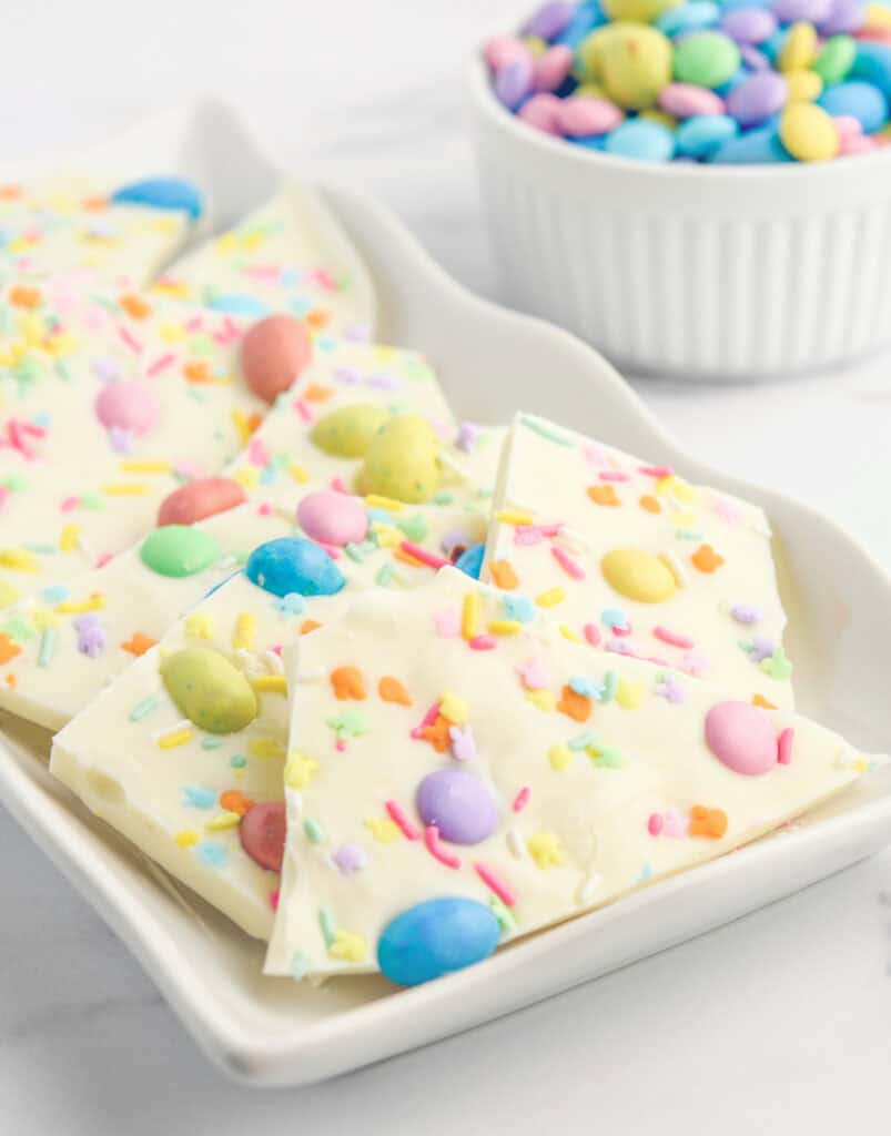 Easter Bark with White Chocolate and Candy on Serving Platter with M&MS in a Bowl