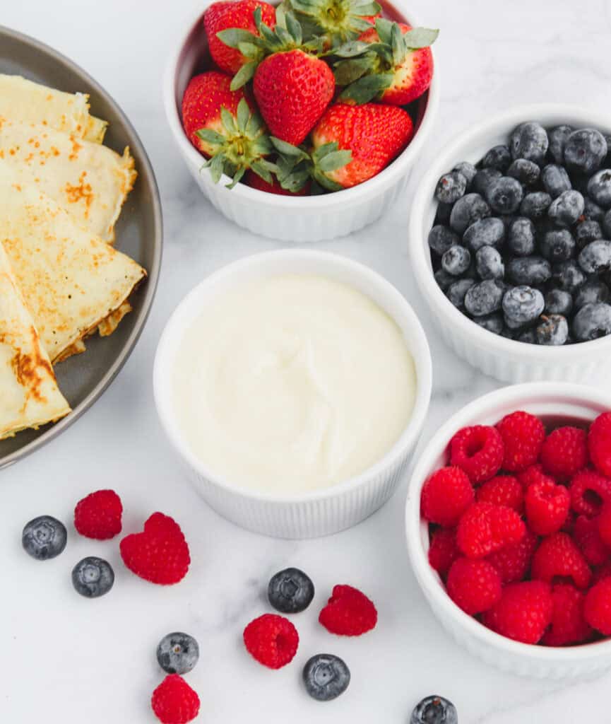 Bowls of Crepe Toppings - Berries, Cream Cheese Filling