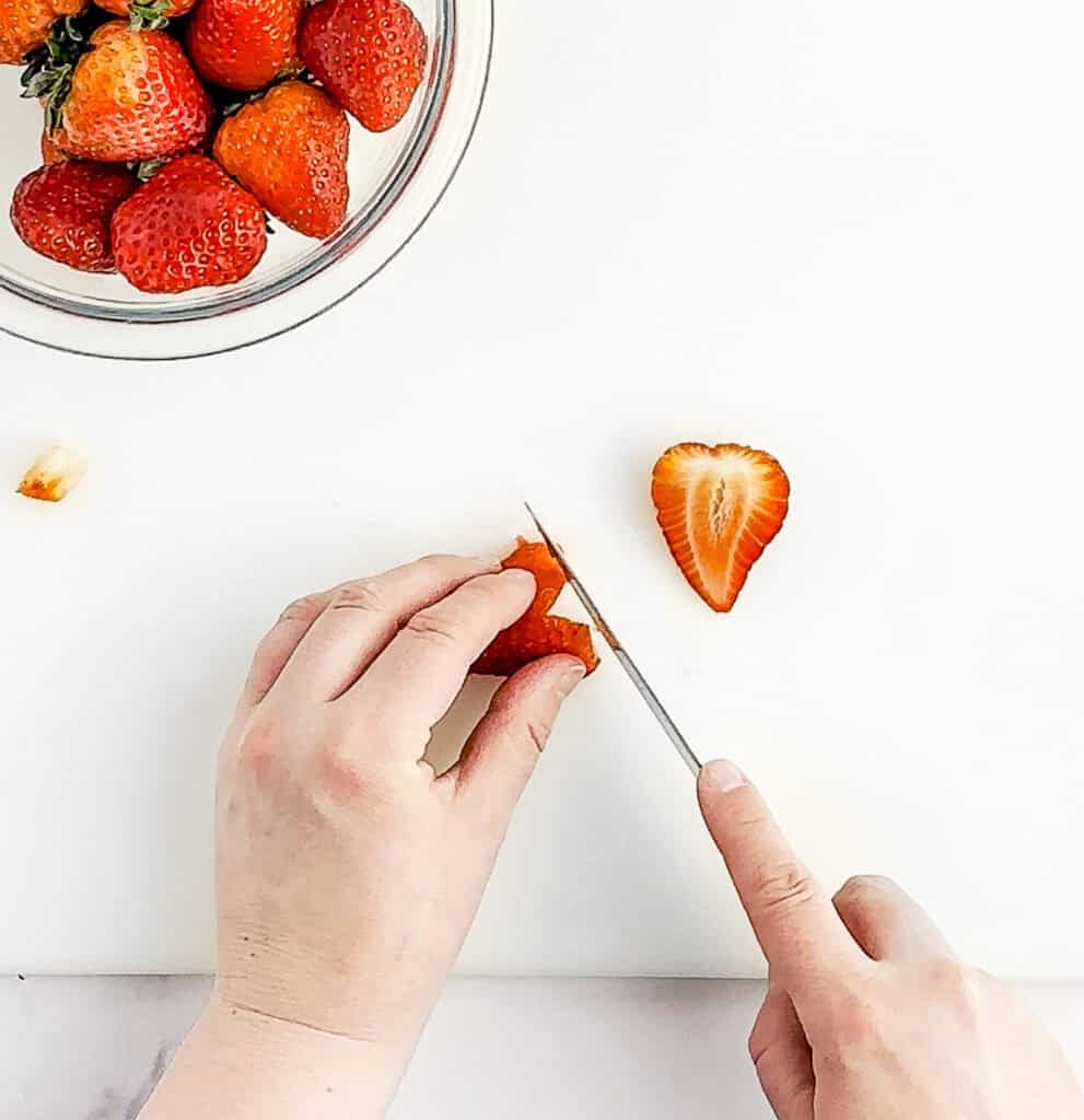 Cutting V Into Strawberry to Form Heart