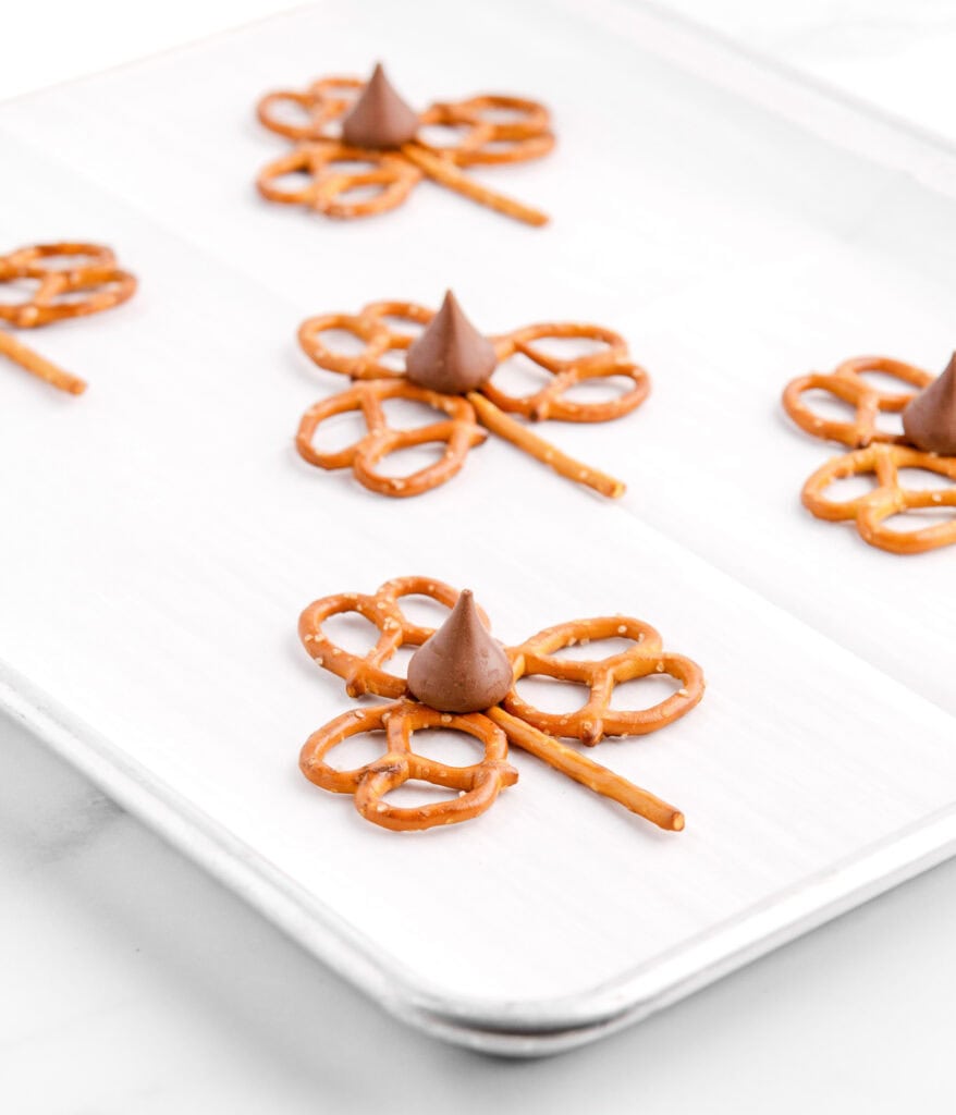 Chocolate on Pretzel Pops on Baking Sheet