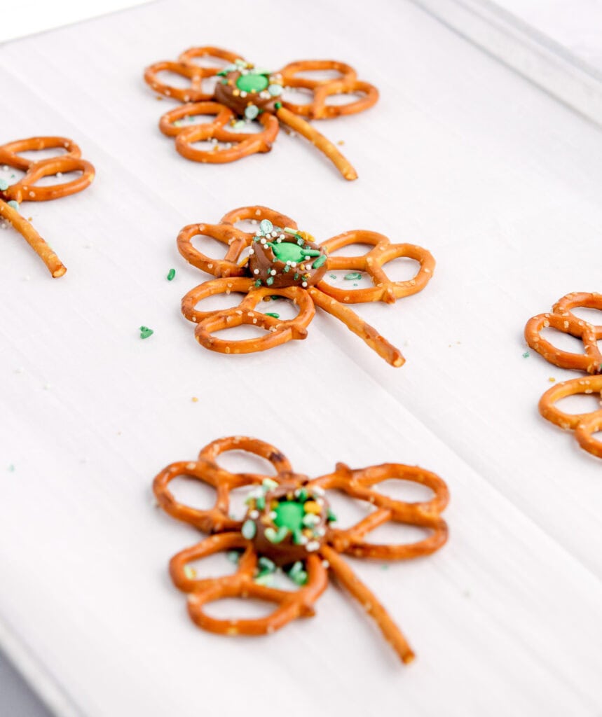 Final Shamrock Pretzel Pops on Baking Sheet