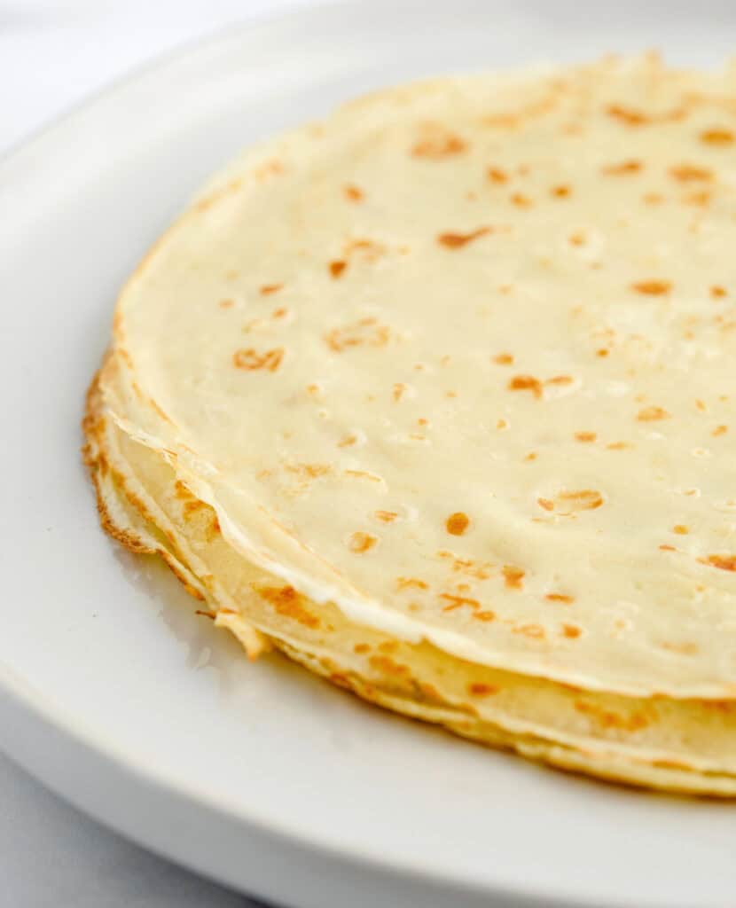 Finished Crepes Stacked on a Plate
