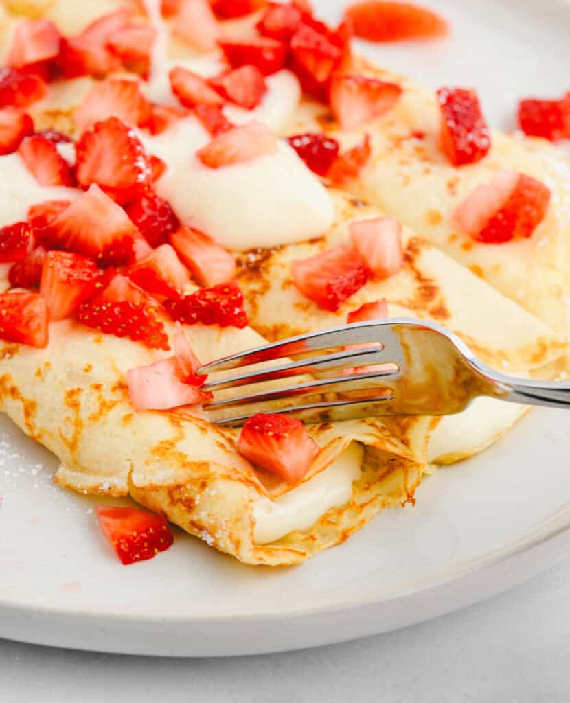 Crepes with Strawberries and Sweet Cream Cheese with Fork